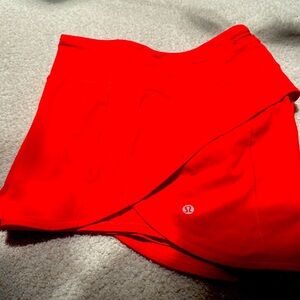 lululemon 4” Speed Short. Reddish orange color. Like new.